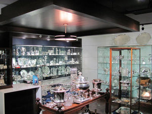 Interior shot of JH Tee Antiques silver shop in Vancouver BC Canada