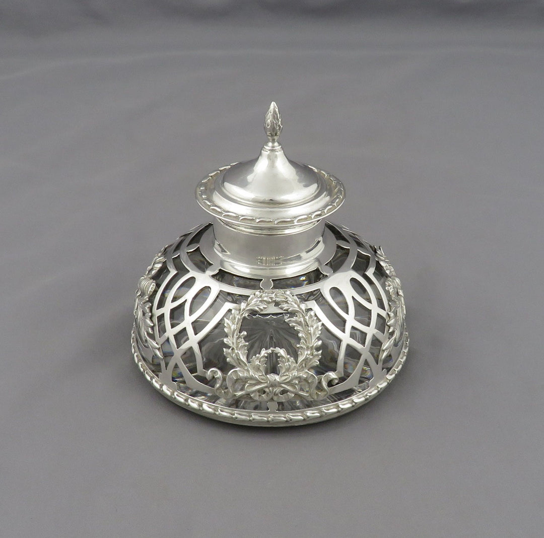 An Edwardian sterling silver overlay glass inkwell by William Gibson &amp;amp; Co, London 1904.
