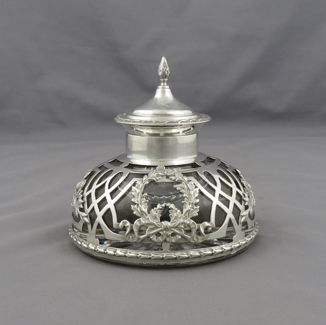 An Edwardian sterling silver overlay glass inkwell by William Gibson &amp;amp; Co, London 1904.