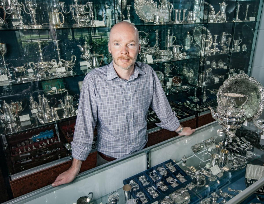 Photo of Justin Tee, proprietor of JH Tee Antiques Ltd in Vancouver