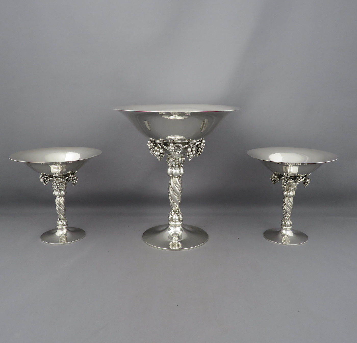 three vintage georg jensen silver tazze with grape decoration