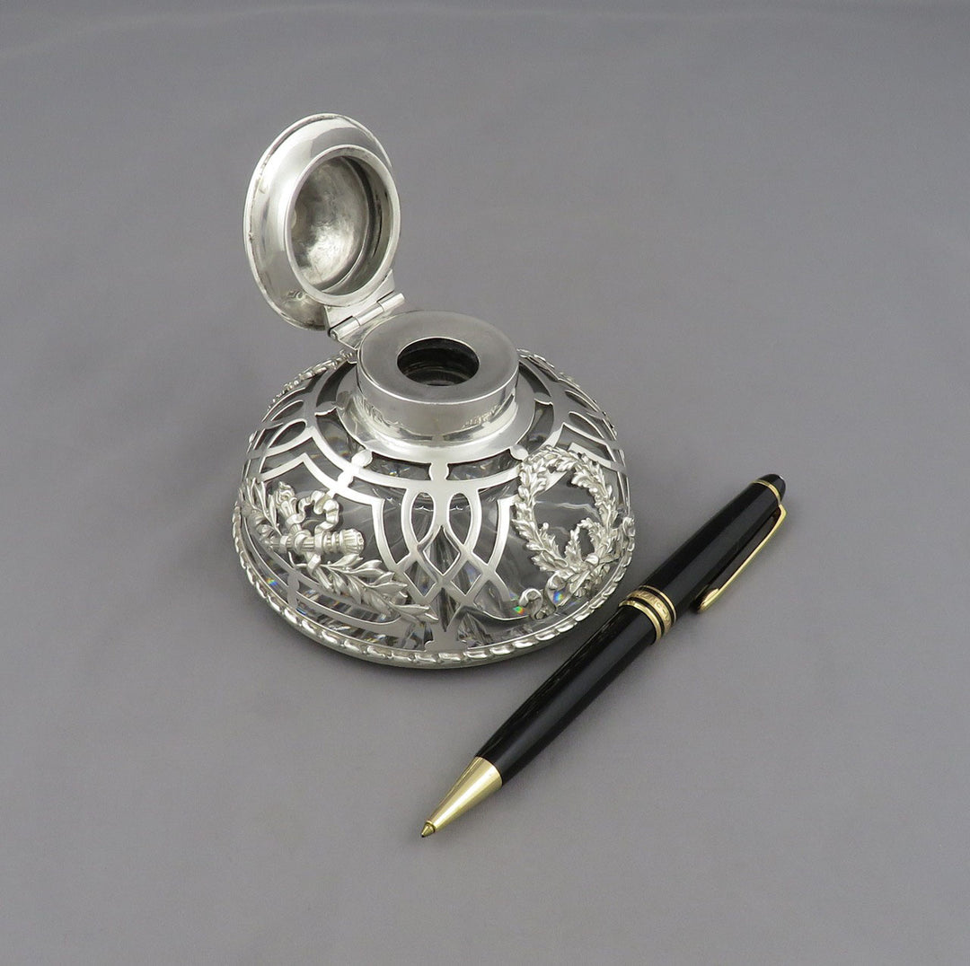 An Edwardian sterling silver overlay glass inkwell by William Gibson &amp;amp; Co, London 1904.