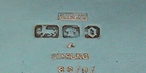 Birks sterling silver mark with sheaf of wheat