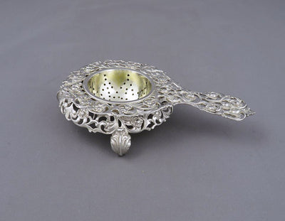 Ornate Silver tea Strainer and Stand - JH Tee Antiques