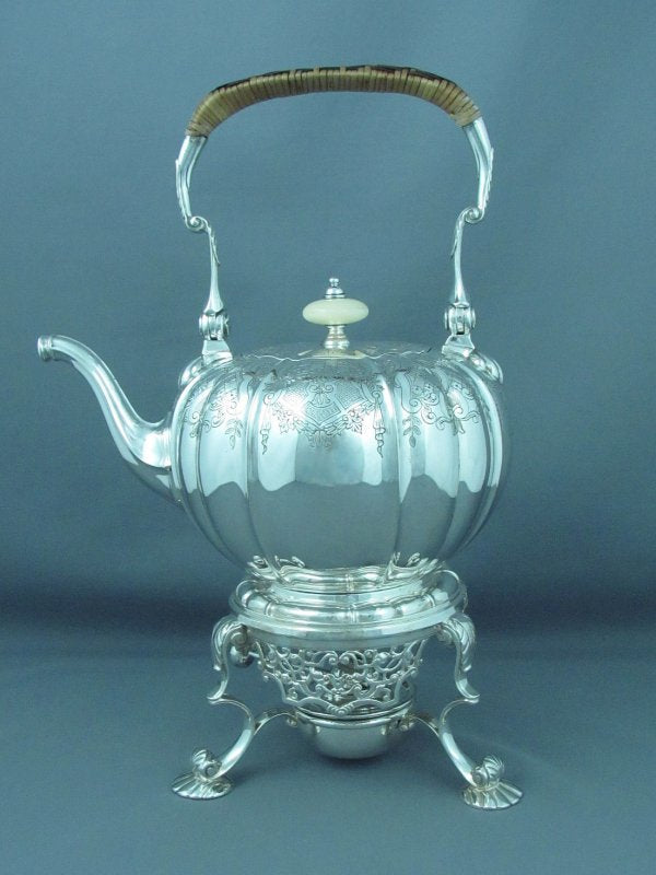 https://justinteeantiques.com/cdn/shop/products/elkington-steling-silver-tea-set-6-e1591301388541_800x.jpg?v=1649361125