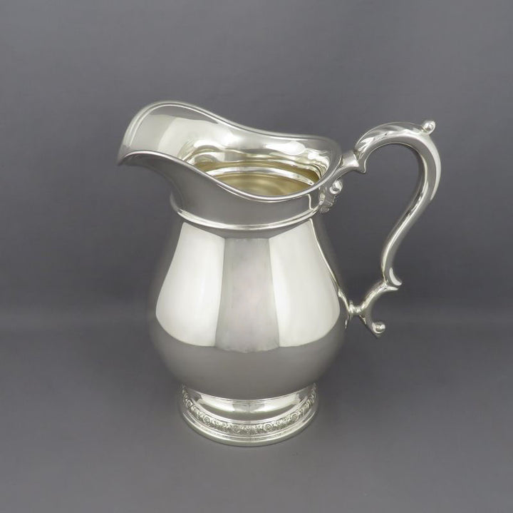 International Sterling Silver Water Pitcher - JH Tee Antiques
